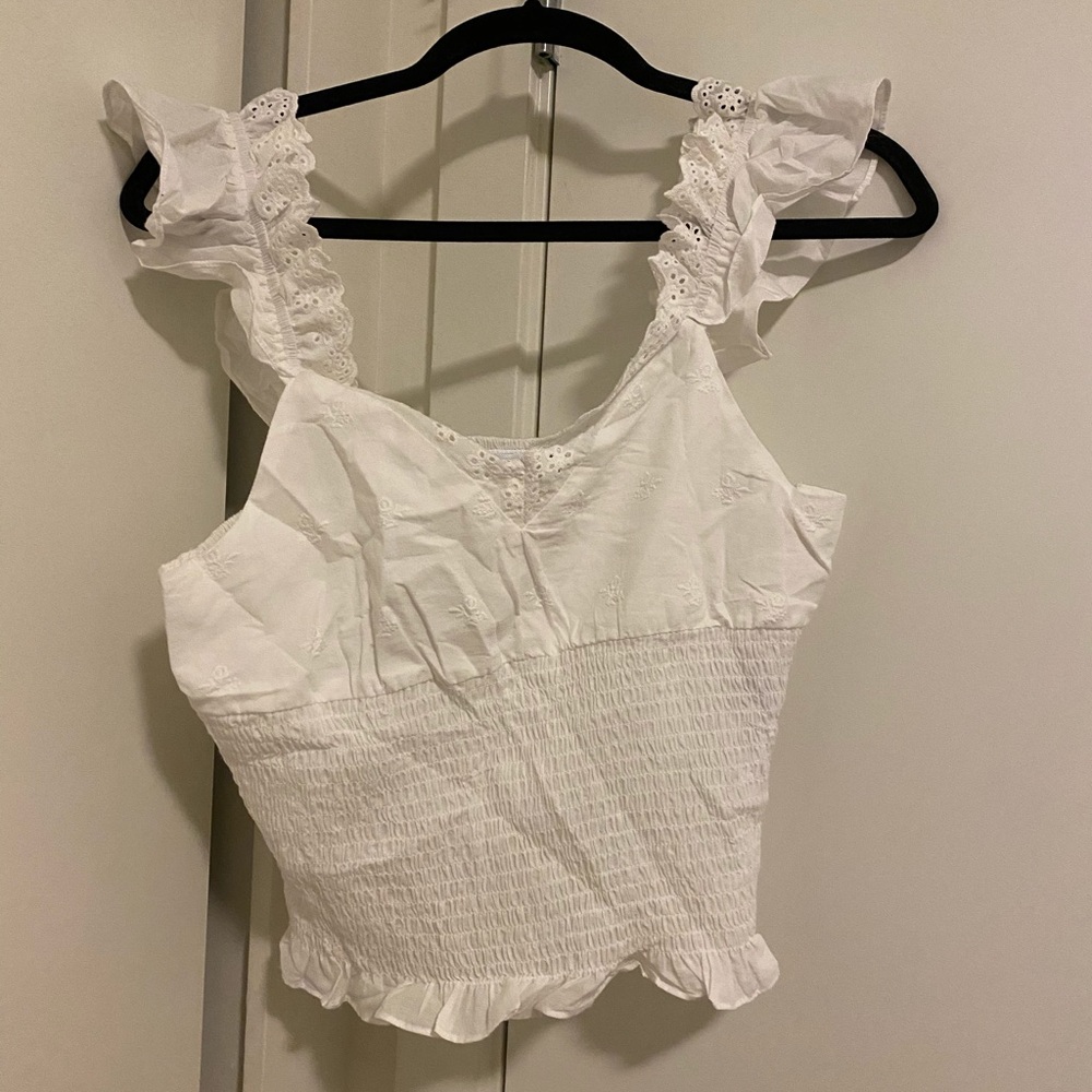 The Latest scoop tank top